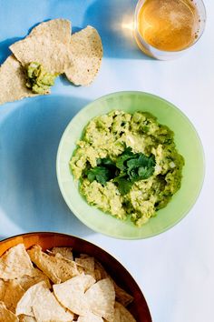 guacamole and tortilla chips on a table