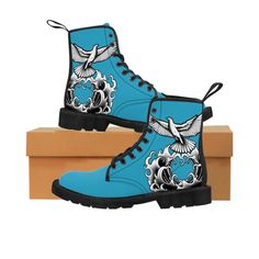 Title: Dove and Waves Baptism SR Women's Canvas Boots | Catholic Custom Culture Clothing Description: Step out in style with these classic Dove and Waves Baptism SR Women's Canvas Boots. Made with a rubber sole and an excellent quality print, these boots are designed to boost your self-confidence and turn heads wherever you go. Available in sizes 6.5 - 11 US, these boots feature a rear pull-loop for easy wear and comfort. Please refer to the metric system for a more precise size guide. At SmAnderson Ranch, we are a devout religious family based in Blanchard, Idaho, USA. As designers since 2002, we aim to share our Catholic Christian faith with the world through our designs. Our goal is to help others wear their faith on their sleeve and represent our Lord and Savior Jesus. Apart from our d Rubber Sole Boots, The Metric System, Metric System, Culture Clothing, Canvas Boots, Full Time Work, Catholic Gifts, The Ranch, Work Boots