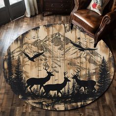 a round rug with deer in the woods