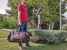 "This duffel bag was inspired by vintage leather duffel and weekend bags from the 1930's & 1940's. Classic minimal styling and gently full grain leather make this bag truly unique. Use it as a duffle bag, weekender, carryall or whatever suits your needs. Handmade of our rich vegetable tanned leather, this bag is built to last. * DETAILS: ✓ Rugged construction - Designed for comfort through the long haul. ✓ Designed to suit both men and women. ✓ Ergonomic/Adjustable & Detachable leather s Stylish Travel Bag, Overnight Travel Bag, Leather Duffel Bag, Leather Weekender Bag, Leather Weekender, Leather Duffel, Sac Week End, Leather Travel Bag, Long Haul