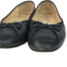 Chanel classic ballerina flats in black lambskin leather with an embroidered CC logo toe cap, grosgrain trim, and leather bow details. Brand = Chanel Condition = 7/10, scuffs to toes, heels, and general wear to soles Size = 36 EU Material = Leather SKU - 22541-34 Chanel Ballerina Flats, Chanel Ballerina, Chanel Flats, Leather Bows, Ballerina Flats, Timeless Handbag, Sneaker Collection, Luxe Fashion, Lambskin Leather