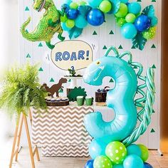 a birthday party with balloons and decorations