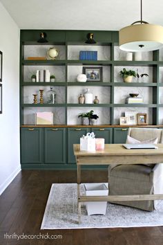 a living room filled with lots of furniture and bookshelves on top of shelves