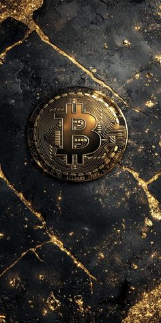 a bit coin sitting on top of a black and gold tiled floor in the dark