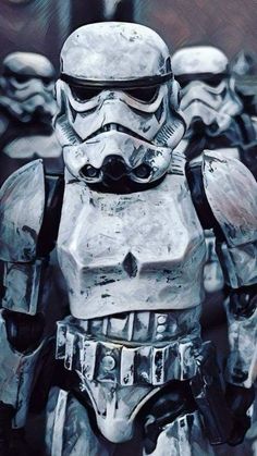 a star wars character is standing in front of other stormtroopers wearing helmets