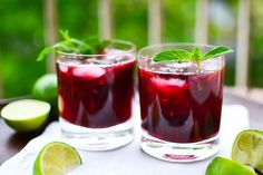 a close up of a drink in a glass on a table