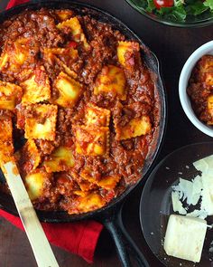 the meal is prepared and ready to be eaten on the table with other dishes around it