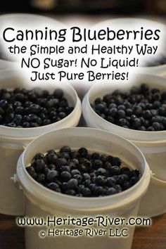 three buckets filled with blueberries sitting on top of a wooden table next to the words canning blueberries the simple and healthy way