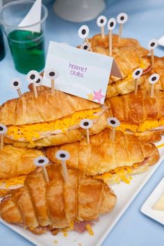 sandwiches with eyeballs on them sitting on a plate