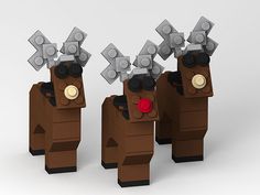 three lego reindeers are standing side by side