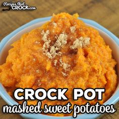 crock pot mashed sweet potatoes in a blue bowl with the words crock pot mashed sweet potatoes