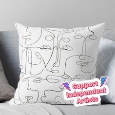 a pillow with the words support independent artists on it