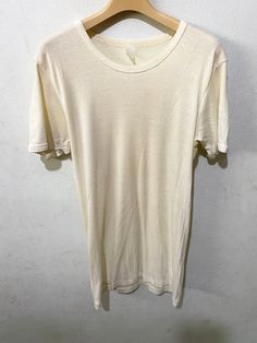 "Vintage 70s Yellow T-Shirt Size: XS Made In Unknown 70s Single Stitch  Ringer Tees color soft yellow Measurements are taken with the garment laying flat. Chest width: 17.5\" Body Length : 28\" Condition: Pre-owned 7/10 Material: 50% Cotton Comment Stain point tear No refund. -Payment : accept paypal only -Shipping : to shipping worldwide by registered airmail (small package) Thai post registered. receiving the item within 7-30 business days non sat-sunday working after payment cleared  (some case in Australia/italy/spain/north and south america 2-4 weeks) I ship every day, monday through Friday! Many times your item will go out same day!! Get your stuff super fast when you buy from me! -Check item status out of my country: http://track.thailandpost.co.th 11C" Fitted Cream T-shirt With Crew Neck, Retro Cream Short Sleeve T-shirt, Beige Retro Crew Neck T-shirt, Retro Beige Crew Neck T-shirt, Vintage Cream Short Sleeve T-shirt, Cream Vintage T-shirt With Relaxed Fit, Fitted Cream Crew Neck T-shirt, Vintage Cream Cotton Top, Cream Short Sleeve Soft-washed T-shirt