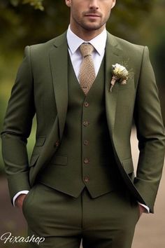 a man in a green suit and tie