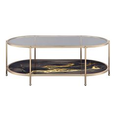 an oval glass coffee table with gold and black marble inlays on the bottom