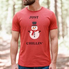 Embrace the winter wonder with our 'Chillin' with Frosty' snowman shirt! Crafted for those who love to cozy up in style, this festive apparel is a perfect blend of comfort and holiday cheer. Made with soft, high-quality fabric, this shirt ensures a snug fit while keeping you in the spirit of the season. The playful design features an adorable snowman, radiating those cool and relaxed vibes that make winter oh-so-special. Whether you're sipping hot cocoa by the fireplace or out for a stroll in a snowy landscape, this shirt is your go-to companion. Its timeless appeal makes it a fantastic gift for friends and family, spreading joy and warmth during the chilly months. Designed to complement your casual wardrobe, 'Chillin' with Frosty' is more than just a shirt - it's a statement of winter bli Cute Winter Holiday T-shirt, Winter Relaxed Fit Screen Print T-shirt, Funny White Winter T-shirt, Let It Snow Somewhere Else Shirt, Funny Winter Holiday T-shirt, Snowman Shirt, Winter Wonder, Cute Snowman, Hello Autumn