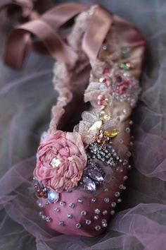 Ornate home decor piece, fairytale ballerina shoe. Inspiration came one of my digital collages where i combined florals over museum canvas shoe photo and got the vision to embellish physical shoe with same rich color and details, musing the baroque era fashion. The vintage ballett shoe has been hand painted mauve/dusty pink shades  and embellished with hand beading -shiny clear seed beads; further accentuated with  tulle flounces at sides, vintage silk pieces w. sequin beading, hand beading, various crystals, diamante trims. The inner sole is covered with printed collage detail of vintage rose. The leather sole is painted  gold. Comes carefully packaged in cardboard box and bubble wrap. NB! This decorative piece is not a toy and not intended for children to play. Contains small details. me Shoe Photo, Baroque Era, Silk Florals, Digital Collages, Canvas Shoe, Era Fashion, Pink Shades, Shoes Photo, Shoe Inspiration