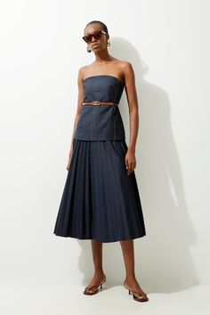 Feel Elevated In Our Midi Dress, With A Universally Flattering Silhouette, A Long Skirt That Creates Flowing Movement, And Pleated Detailing. The Denim Fabric Creates A More Relaxed Style, So Style This Dress With Sandals, Loafers, Or Heels For A Look That Goes Seamlessly From Day To Night. Tailored Denim Bandeau Pleated Full Skirted Midaxi Dress High Quality Denim Fabric Flattering Fit And Flare Silhouette Bandeau Neckline Belted Waistline Textured, Pleated Skirt Drop Waist Bodice Midi Length R Hen Do Outfits, Bride Jumpsuit, Petite Wedding Guest Dresses, Eid Outfits, Tall Dresses, Outfits Petite, Full Skirt Dress, Midaxi Dress, Wedding Guest Dress Summer