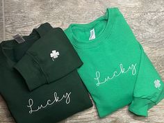 "St. Patrick's Day Sweatshirt - Lucky Sweatshirt - Clover Sweatshirt - St. Patty's Day Sweatshirt - Lucky Sweater Embroidered - Clover Sweater The \"Lucky\" four leaf clovers sweatshirt is super cute. The sweatshirts are perfect for St. Patrick's Day. They're embroidered with the word \"Lucky\" on the center and a four leaf clover on the left sleeve. The sweaters are available in Irish Green and Dark Green. DESIGN DESCRIPTION: Design measures approximately 5\" across the center of the sweatshirt Green Long Sleeve Sweatshirt For Game Day, Game Day Green Winter Sweatshirt, Green Winter Sweatshirt For Game Day, Green Sweatshirt For Game Day In Winter, Green Tops For Game Day In Winter, Diy St Patricks Day Shirt, Lucky Four Leaf Clover, Commercial Embroidery Machine, St Patrick's Day Outfit