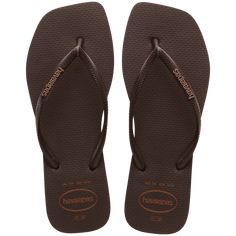 The Havaianas Slim Square Logo Pop Up is a model favorite. The square-toe silhouette is sleek, modern and perfect for any closet. Available in neutral tones, discover our newest version with a metallic logo detail on the strap for extra sophistication. Upper: 100% PVC Outsole: 98.5% rubber, 1.5% PU Thong style Square shaped Cushioned footbed with textured rice pattern and rubber flip flop sole Made in Brazil Brown Flip Flops, Havaianas Flip Flops, Baby Sandals, Sandals For Sale