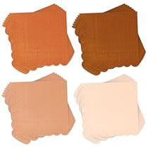 four different shades of brown and white paper