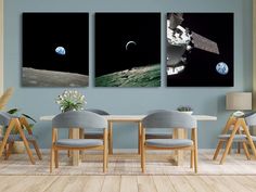 three pictures of the earth, moon and space shuttle hanging on a wall in a dining room