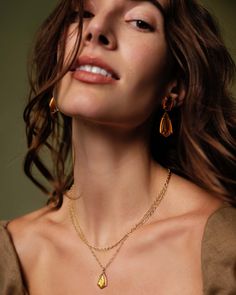 Thoughtfully designed for your styling needs, the Camry Gold Enamel Frame Multi Strand Necklace in Marbled Amber Illusion takes the guesswork out of necklace layering. A kite-shaped stone with a hand-painted enamel frame takes the spotlight in this duo, with a complementary chain adding just enough dimension. As timeless as it is fashion forward, this multi strand is bound to be part of your regular rotation. Metal 14k Yellow Gold Over Brass Material Marbled Amber Illusion Closure Lobster Clasp Layering Pendant Chain Necklace, Delicate Chain Teardrop Necklace For Layering, Teardrop Delicate Chain Necklace For Layering, Delicate Teardrop Pendant Chain For Layering, Everyday Layered Jewelry, Layered Gold-plated Necklace For Gifts, Layered Gold Plated Necklaces As Gift, Layered Gold Plated Necklaces For Gifts, Layered Gold Plated Jewelry As Gift