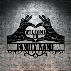 a metal sign that says welcome to family name with two hands in the shape of a heart