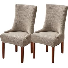 pair of upholstered dining chairs with wood legs in beige herringbone pattern fabric