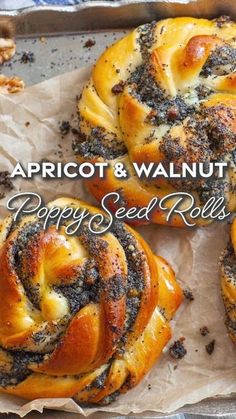 some bread rolls are sitting on top of wax paper with the words apricot and walnut poppy seed rolls