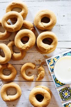 doughnuts and a glass of milk on a table