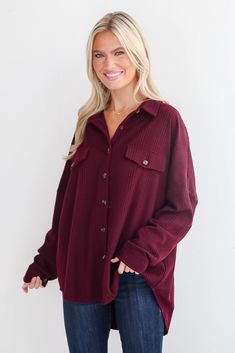 Week in and week out, we're always ready to reach for an easily adorable top like the Reliably Cozy Wine Knit Button-Up Top! Crafted from a soft, textured knit fabric, this blouse features a rich wine hue that adds depth and sophistication to any outfit. The classic button-up design is complemented by a relaxed fit and long sleeves, making it perfect for both casual and dressier occasions. The subtle texture provides visual interest, while the button details allow for versatile styling—wear it b Long Sleeve Shirts For Women, Red Button Down Shirt, Casual Blouses, Boutique Shirts, Women's Uniforms, Trendy Tops For Women, Clothes Cute, Wine Shirts