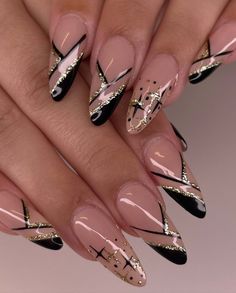 Get ready to sparkle into 2025 with these 15 stunning New Year’s Eve nail ideas! From glittery gold to chic snowflake tips, these nail designs will have you party-ready in no time. Perfect for DIY nail art or salon inspo, these trendy looks are a must-try this holiday season. Find the perfect style to match your New Year’s vibe, nail art, New Year nails, nail ideas, New Year’s Eve nails, glitter nails, winter nail designs. winter nails, new years eve nails design Black And Gold New Years Nails, Gold Winter Nails, Year Nails, Nails Winter, Nails Glitter, Winter Nail Designs, Winter Nail