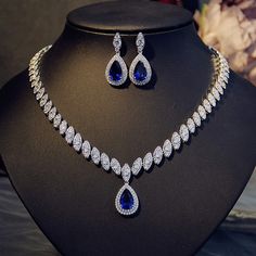 Glamorous Modern Princess Teardrop Bridal Royal Blue Crystals Necklace Earrings Set. Bridal Jewelry Set sold by Letsglamup on Storenvy قلادات متدلية, Blue Crystal Necklace, Diamond Jewelry Set, Afrikaanse Mode, Expensive Jewelry Luxury, Diamond Necklace Designs, Diamond Necklace Set, Diamond Jewelry Necklace, Blue Stones