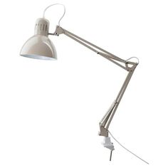 a white desk lamp with an adjustable arm and one light on the side, against a white background