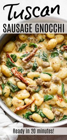 a white bowl filled with sausage gnocchini and spinach