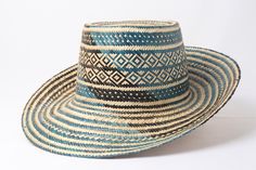 "Men Straw Hat Black & Blue 100% Handwoven - Wayuu hats All sizes for men & women - And Can Be Costumized As Wished (Hat Color With PomPom Color ) ☆Size & Weight : *Size: ▪Circumference : 21.5,22,23,24 inches (ask for your size in a note ) ▪Height : 11.50 Cm ▪brim : 9 cm - ⭐️Shipping: DHL : * USA, Central & North America: 2-3 Business Days * Rest of The World: 4-6 Business Days - sun hats beach hats straw hats sun straw hat straw hat pompoms wayuu hat with pompoms - For ANY Quest Blue Artisan Hat With Flat Brim, Artisan Blue Fedora Hats, Artisan Blue Hat With Flat Brim, Artisan Blue Wide Brim Hat, Artisan Blue Brimmed Hat, Artisan Blue Flat Brim Hat, Traditional Blue Hats For Summer, Traditional Blue Hat With Curved Brim, Blue Woven Hat With Curved Brim