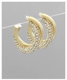 Adorable small crystal gold hoops Size of earring 20mm x 6mm wide Gold Crystal Single Earring, Metal Hoop Jewelry With Bling, Crystal Hoop Earrings With Rhinestones As Gift, Gold Metal Hoop Earrings With Rhinestones, Gold Metal Hoop Earrings With Bling, Gold Crystal Hoop Earrings With Rhinestones, Trendy Hoop Jewelry With Rhinestones, Gold Hoop Earrings With Crystal, Small Hoop Cubic Zirconia Crystal Earrings