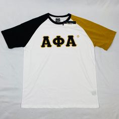 -Premium Cotton Material Raglan Sleeves -Light grey, Black, & Old Gold -Embroidered Logos Collegiate Style Fitted Tops For Spring, Collegiate College Tops With Embroidered Logo, Collegiate Tops With Embroidered Logo For College, Short Sleeve Tops With Embroidered Graphics For College, Varsity Short Sleeve Tops For Fall, Black Embroidered Graphic Tops For College, Black Embroidered Tops For College, Collegiate Tops With Embroidered Graphics For College, Black Varsity Tops With Embroidered Logo