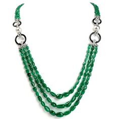 Fell the prestige of this glamorous and elegant Diamond Emerald Pearl & Onyx 18K Gold Multistrand Bead Necklace!  Thisbeautiful necklace is crafted in 18-karat white gold, with a lobster clasp and adjustable links for length variation.  Itdisplays two 11-millimeter genuine pearls with high luster and minor blemishes, on both side of the necklace.  Above and below theheavenly pearls are four genuine onyx circle motifs.  There are also eight gold scroll designs encrusted with sparklinggenuine Yellow Gold Wedding Band, Jewelry Appraisal, Gold Band Ring, Gems Jewelry, Buying Jewelry, Selling Jewelry, Vintage Diamond, Multi Strand, Antique Rings