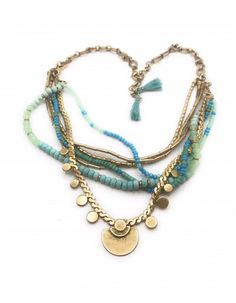 Isa Disc Stella & Dot Necklace - N516 Layers of semi precious turquoise stones and beads cascade from a handmade vintage gold chain. Inspired by vintage coins and a warm boho beach vibe. Individual gold strand with discs detaches to create a beaded necklace, or remove the colored strands for an all gold look.Vintage gold plating. 25 1/2" length. Lobster clasp closure. can be worn multiple ways. In excellent like new condition. Bohemian Multi-strand Brass Jewelry, Bohemian Multi-strand Beaded Necklace With Adjustable Chain, Gold Bohemian Coin Necklace, Bohemian Multi-strand Layered Necklace With Adjustable Chain, Blue Beaded Brass Necklaces, Bohemian Gold Dangle Beaded Necklaces, Bohemian Gold Coin Necklace, Bohemian Gold Dangle Beaded Necklace, Gold Bohemian Beaded Metal Necklace