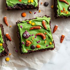 halloween brownies with green frosting and candy decorations