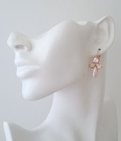 "✤ I can make these earrings with many other colors to match your wedding party scheme (or any other occasion). Please just contact me. ✤ Matching bracelet is available here : https://etsy.me/2WJmM3X ✤ Made with CRYSTALLIZED™ - Swarovski crystals. ✤ Drop/lever back Earrings. Clip-on earrings are available upon request. ✤ Size of elements approx - 25 x 18 mm. Length 35 mm(including hook) ✤ Colors: White pearl, white opal, clear crystal, rose gold plated brass. ✤ Stones are hand set in secure pron Feminine Bridal Drop Earrings As Gift, Feminine Bridal Drop Earrings For Gifts, Feminine Rose Gold Pearl Earrings Gift, Elegant Pink Clip-on Earrings, Rose Gold Drop Earrings With Pearl Detail For Bridal, Rose Gold Bridal Drop Earrings With Pearl, Feminine Pink Pearl Earrings For Wedding, Pink Feminine Pearl Earrings For Wedding, Rose Gold Teardrop Pearl Earrings For Party