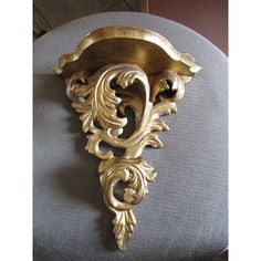 1950's Italian Florentine Carved Gesso Giltwood Wall Display Shelf/ Bracket. Rococo form, beautiful flourish detail. Wall Display Shelf, Wall Shelf Display, Laminate Wall, Osvaldo Borsani, Shelf Bracket, Shelf Display, Display Shelf, Shelf Brackets, Wall Mounted Shelves