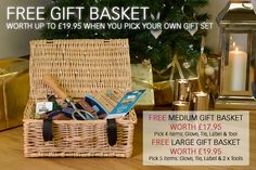 a wicker basket filled with items next to a christmas tree