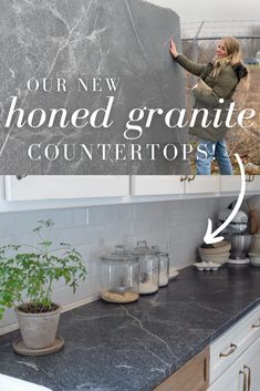 a woman standing on top of a kitchen counter next to a blackboard that says, our new homemade granite countertops