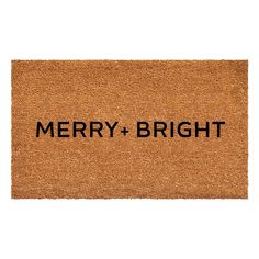 merry and bright door mat with the words merry and bright in black ink on it