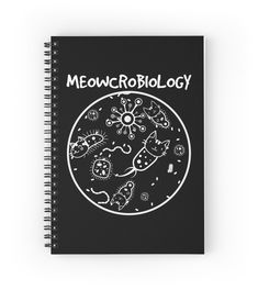 a spiral notebook with the words meowcroblogy written in white ink