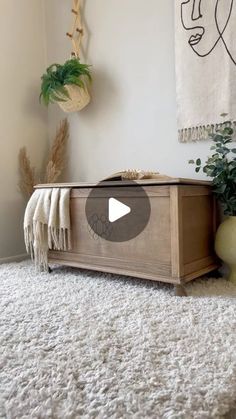 a wooden box sitting on top of a white rug