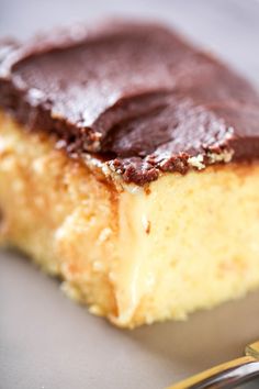 a piece of cake sitting on top of a white plate